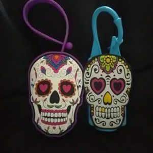 2 Small hand sanitizer carriers